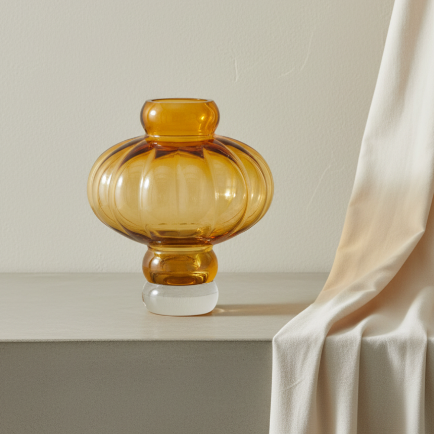 Balloon Vase 02 Amber with limewash backdrop and ivory drape