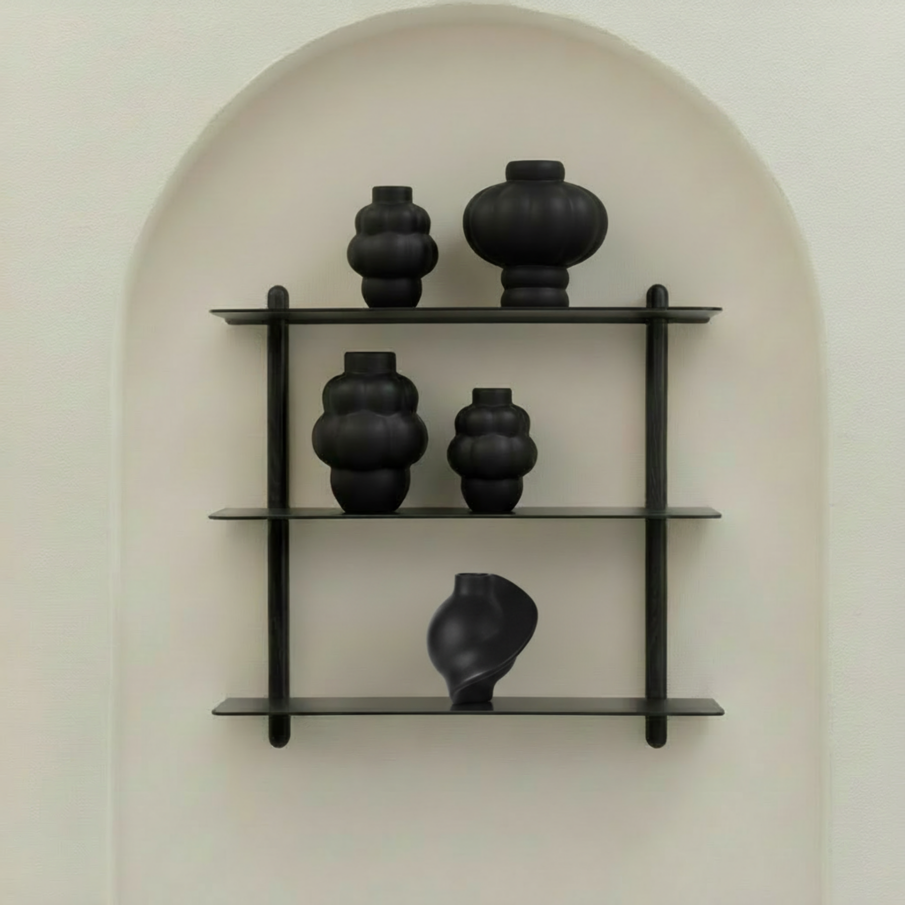 Nivo shelf with four vases in arch