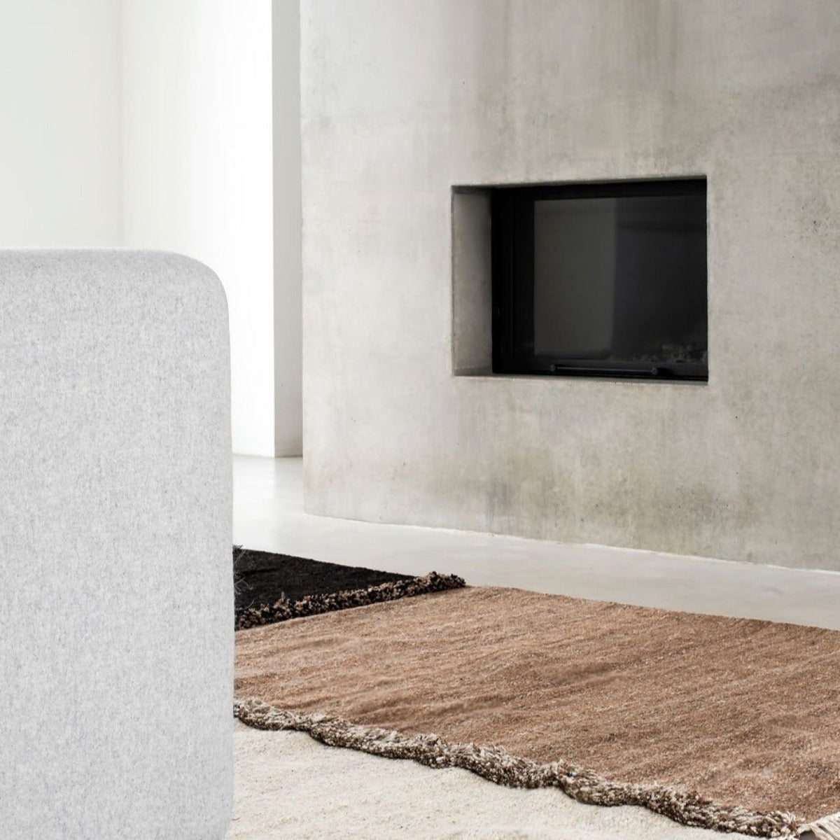 Sera Helsinki, Finnish designed hand-made rugs from Ethiopia, fair-trade, ethically made. Available exclusively in North America, Canada and USA, through Studio Nordhaven. E-1027 knotted - white, brown + black