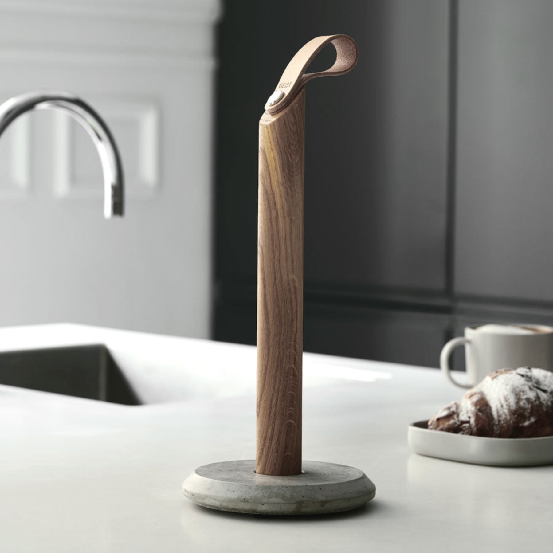 Grab Paper Towel Holder - solid oak wood, leather loop with poured concrete base has Nordic look.  This Scandinavian designed elegant paper towel holder from  is a bestselling item by Gejst Denmark.