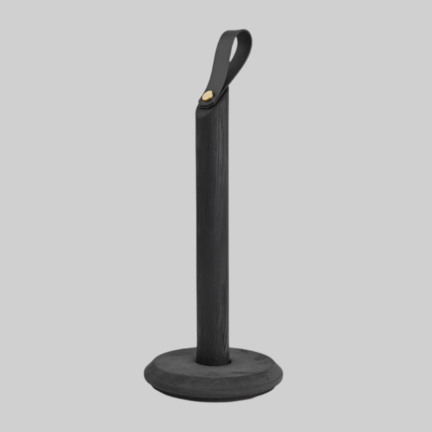 Grab Paper Towel Holder - Black solid oak wood, leather loop with poured concrete base has Nordic look.  This Scandinavian designed elegant paper towel holder from  is a bestselling item by Gejst Denmark.