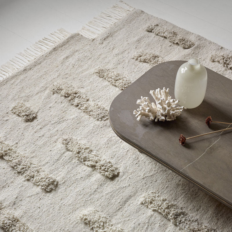 Sera Helsinki, Finnish designed hand-made rugs from Ethiopia, fair-trade, ethically made. Available exclusively in North America, Canada and USA, through Studio Nordhaven. Laine Woven Rug - White + White - Saaristo Collection