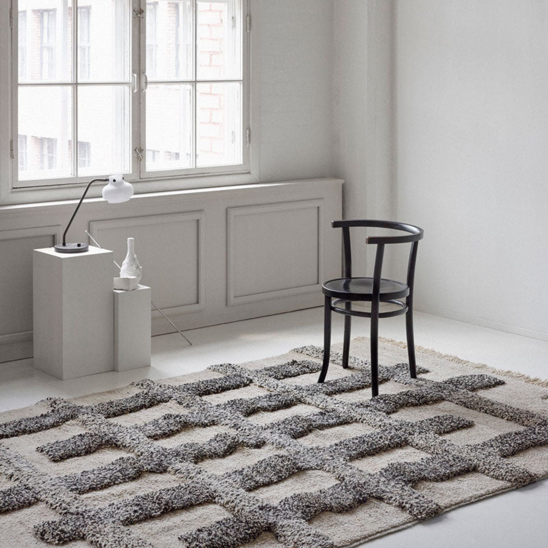 Sera Helsinki, Finnish designed hand-made rugs from Ethiopia, fair-trade, ethically made. Available exclusively in North America, Canada and USA, through Studio Nordhaven. Valli Knotted Wool Rug - White + Beige - Saaristo Collection