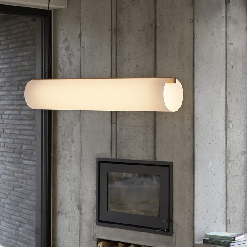 Pendant light placed by the fireplace