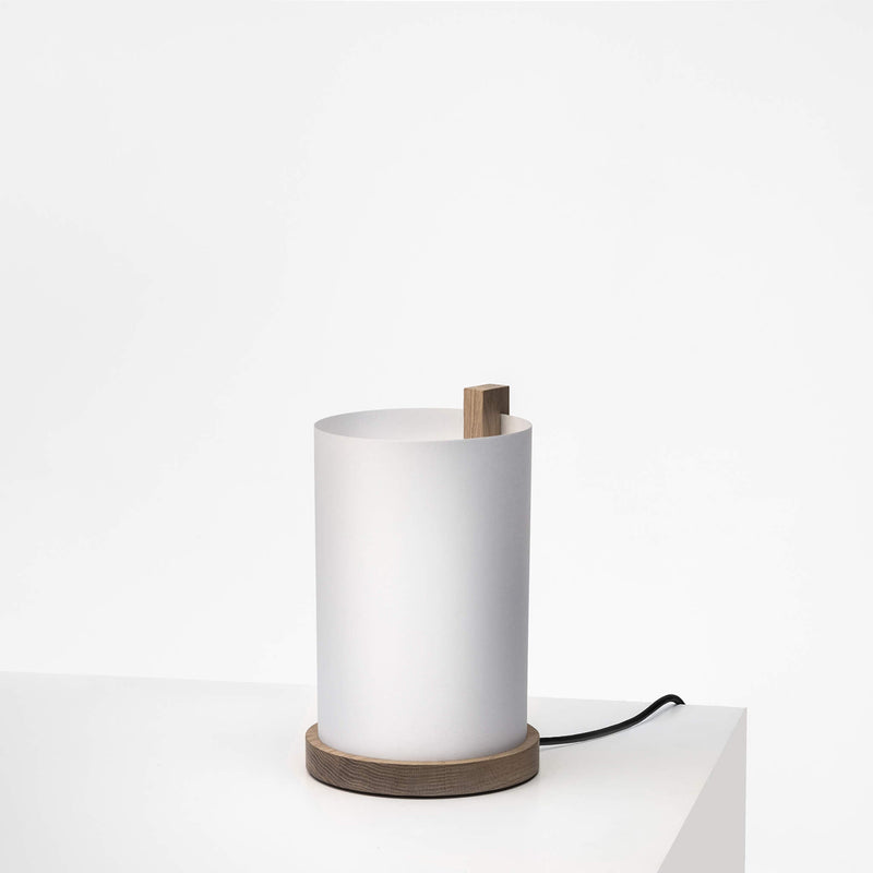 Small table lamp with lights off, side view