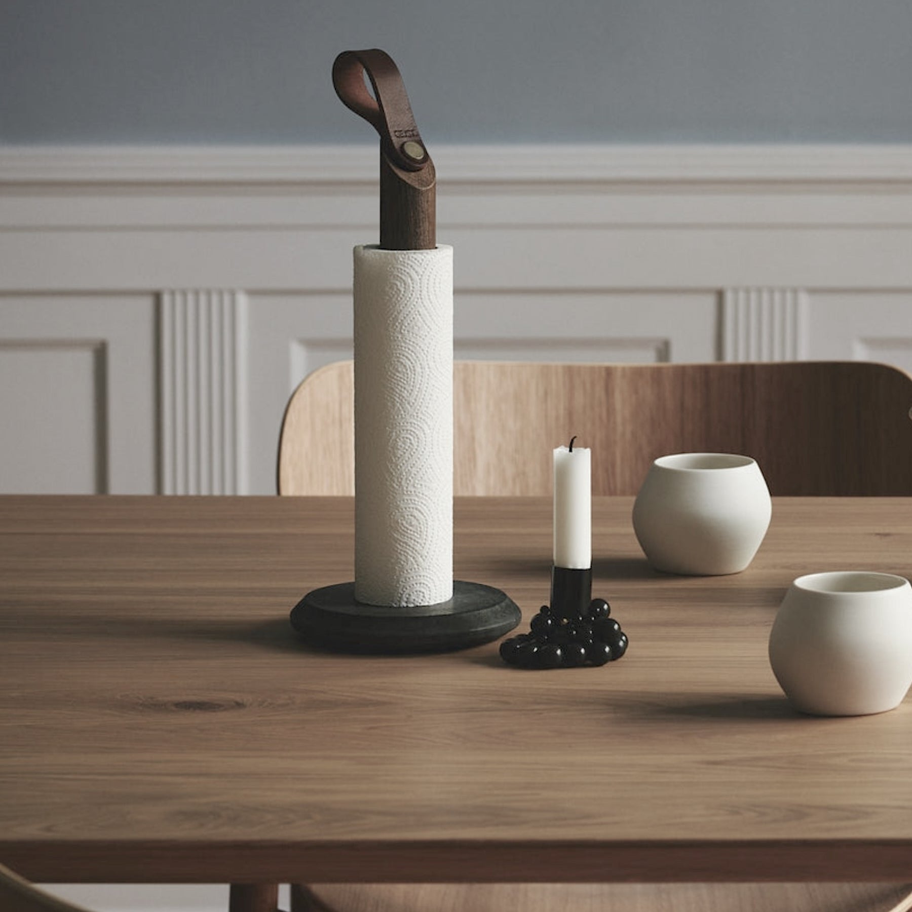 Grab Paper Towel Holder - solid oak wood, leather loop with poured concrete base has Nordic look.  This Scandinavian designed elegant paper towel holder from  is a bestselling item by Gejst Denmark.
