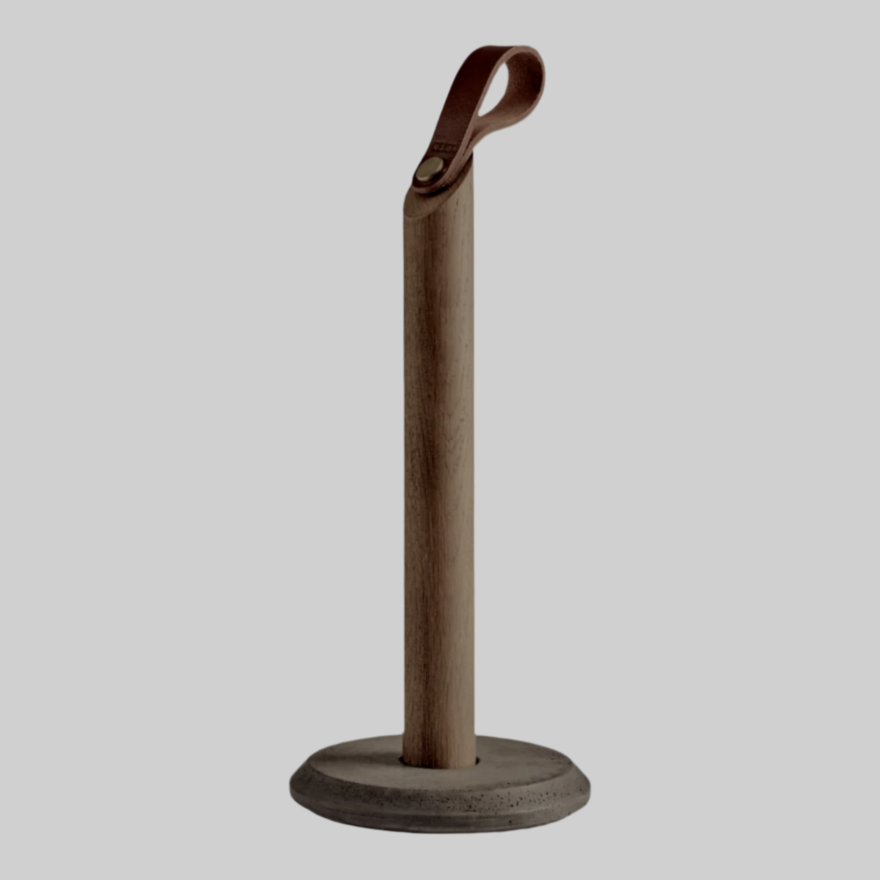 Grab Paper Towel Holder - solid oak wood, leather loop with poured concrete base has Nordic look.  This Scandinavian designed elegant paper towel holder from  is a bestselling item by Gejst Denmark.