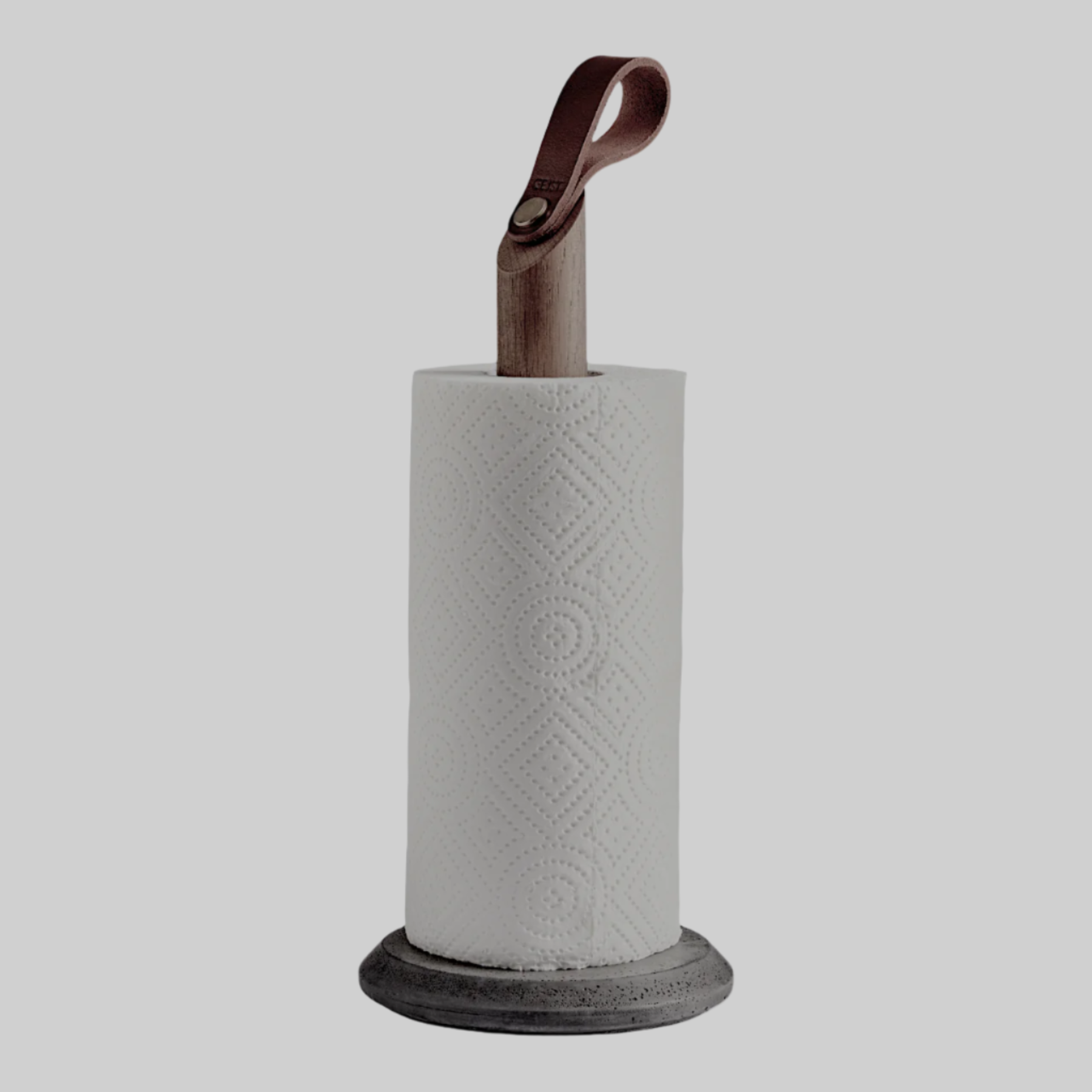 Grab Paper Towel Holder - solid oak wood, leather loop with poured concrete base has Nordic look.  This Scandinavian designed elegant paper towel holder from  is a bestselling item by Gejst Denmark.