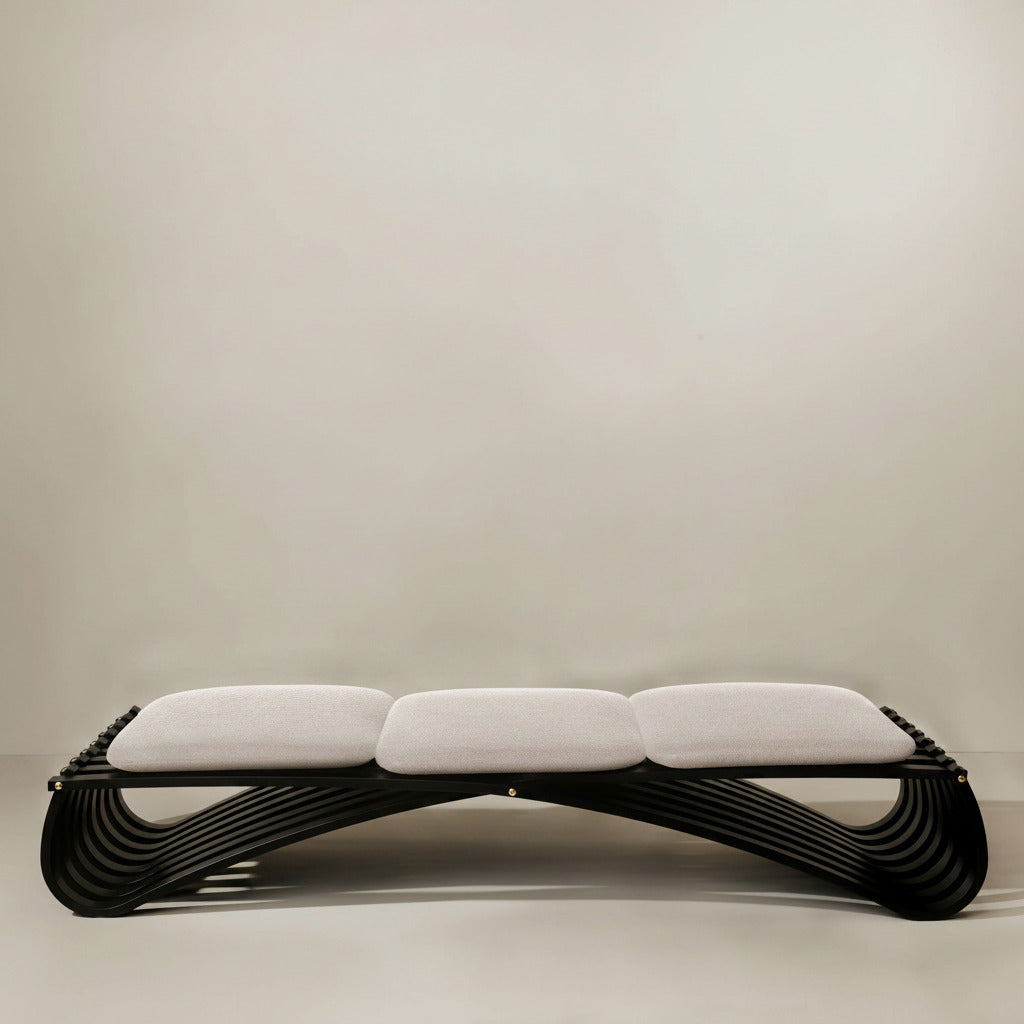 Black wooden daybed with three beige textile cushions, front view