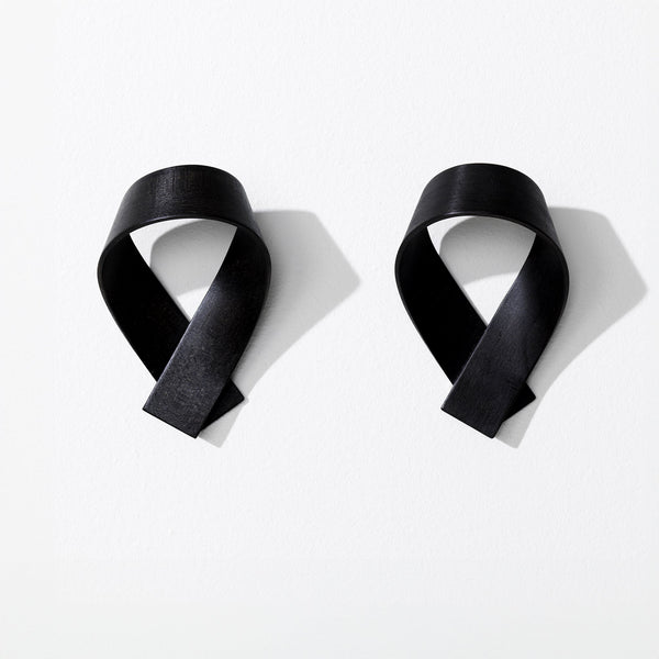 Set of two black coat hooks, front view
