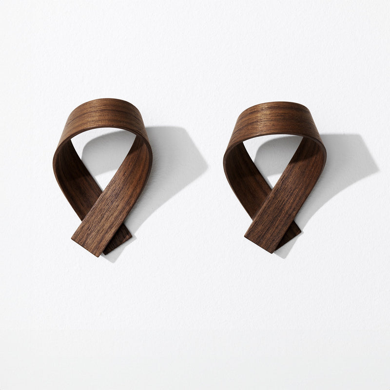 Set of two walnut brown coat hooks, front view