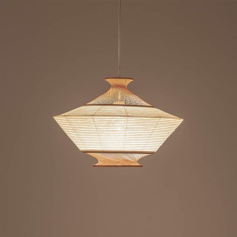 Pendant light made of bamboo and paper, lights on