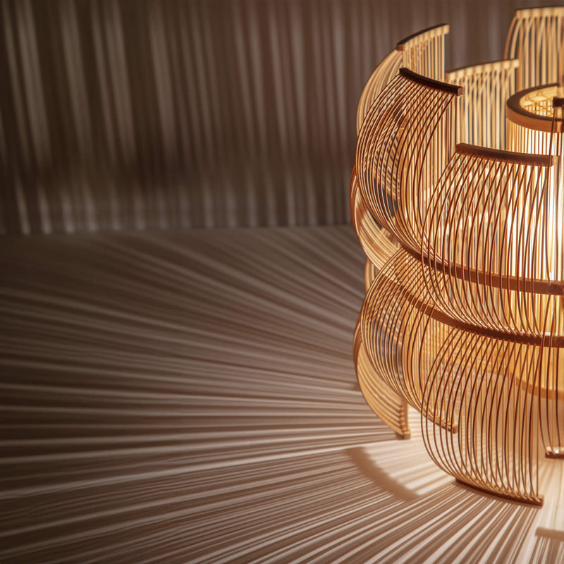 Close up of bamboo table lamp and the light it casts