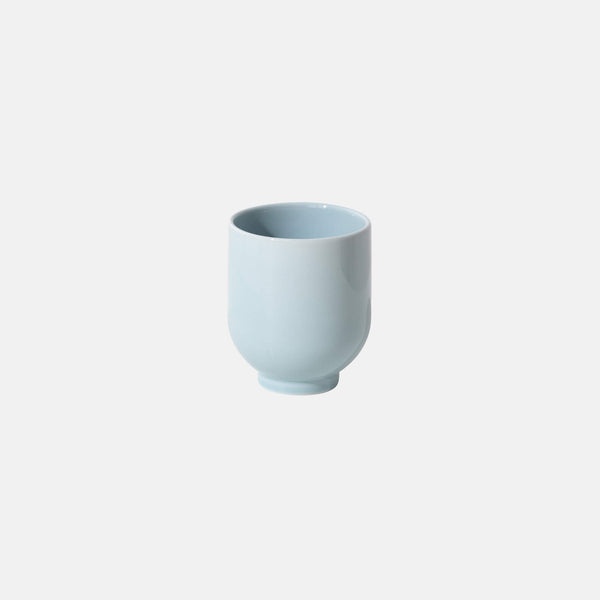 Light blue tea mug, cylindrical shape, front view