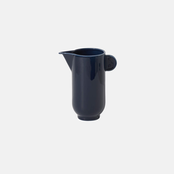 Side view of the tea pitcher, navy blue version