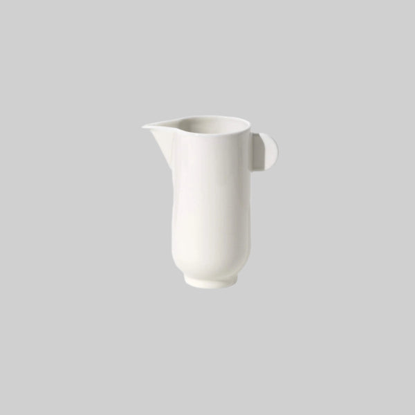 Porcelain tea pitcher with a small handle, side view