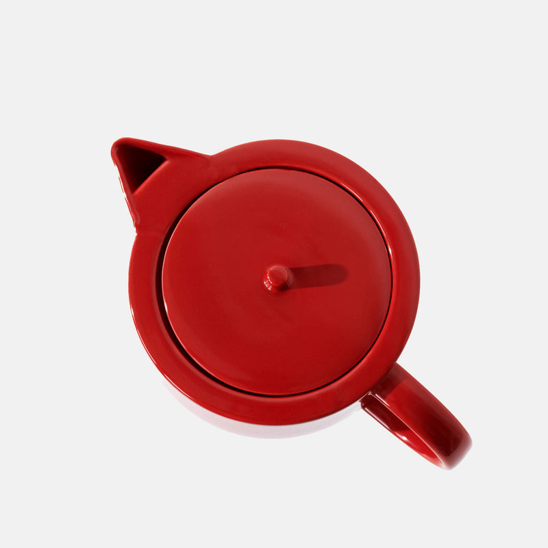 Close up of a red porcelain teapot, top view