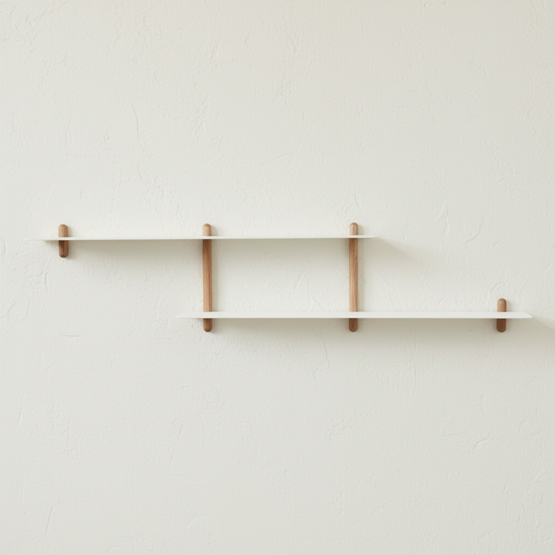 Nordic wall shelves front view with limewashed ivory background