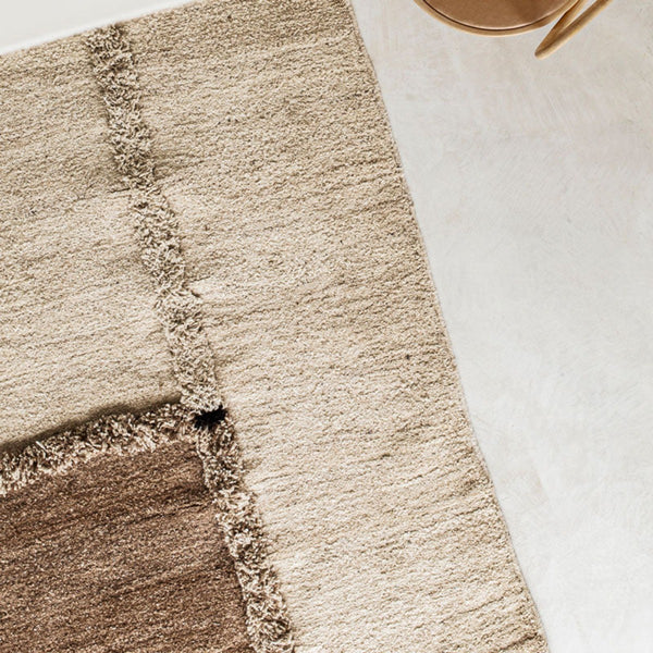 Sera Helsinki, Finnish designed hand-made rugs from Ethiopia, fair-trade, ethically made.  Available exclusively in  North America, Canada and USA, through Studio Nordhaven.  E-1027 knotted -  white + brown