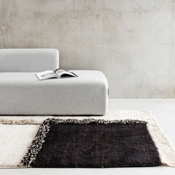 Sera Helsinki, Finnish designed hand-made rugs from Ethiopia, fair-trade, ethically made.  Available exclusively in  North America, Canada and USA, through Studio Nordhaven.  E-1027 knotted -  white + black