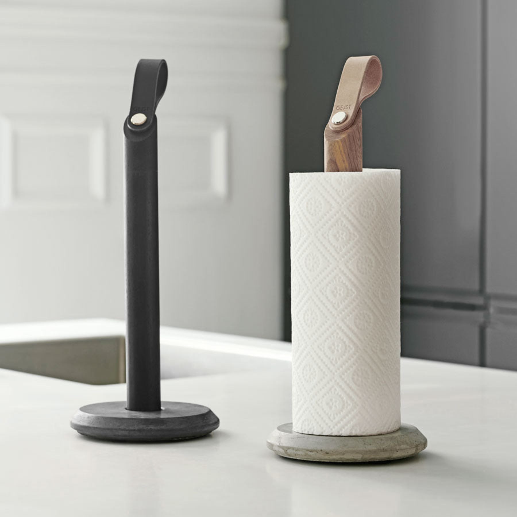 Grab Paper Towel Holder - solid oak wood, leather loop with poured concrete base has Nordic look.  This Scandinavian designed elegant paper towel holder from  is a bestselling item by Gejst Denmark.