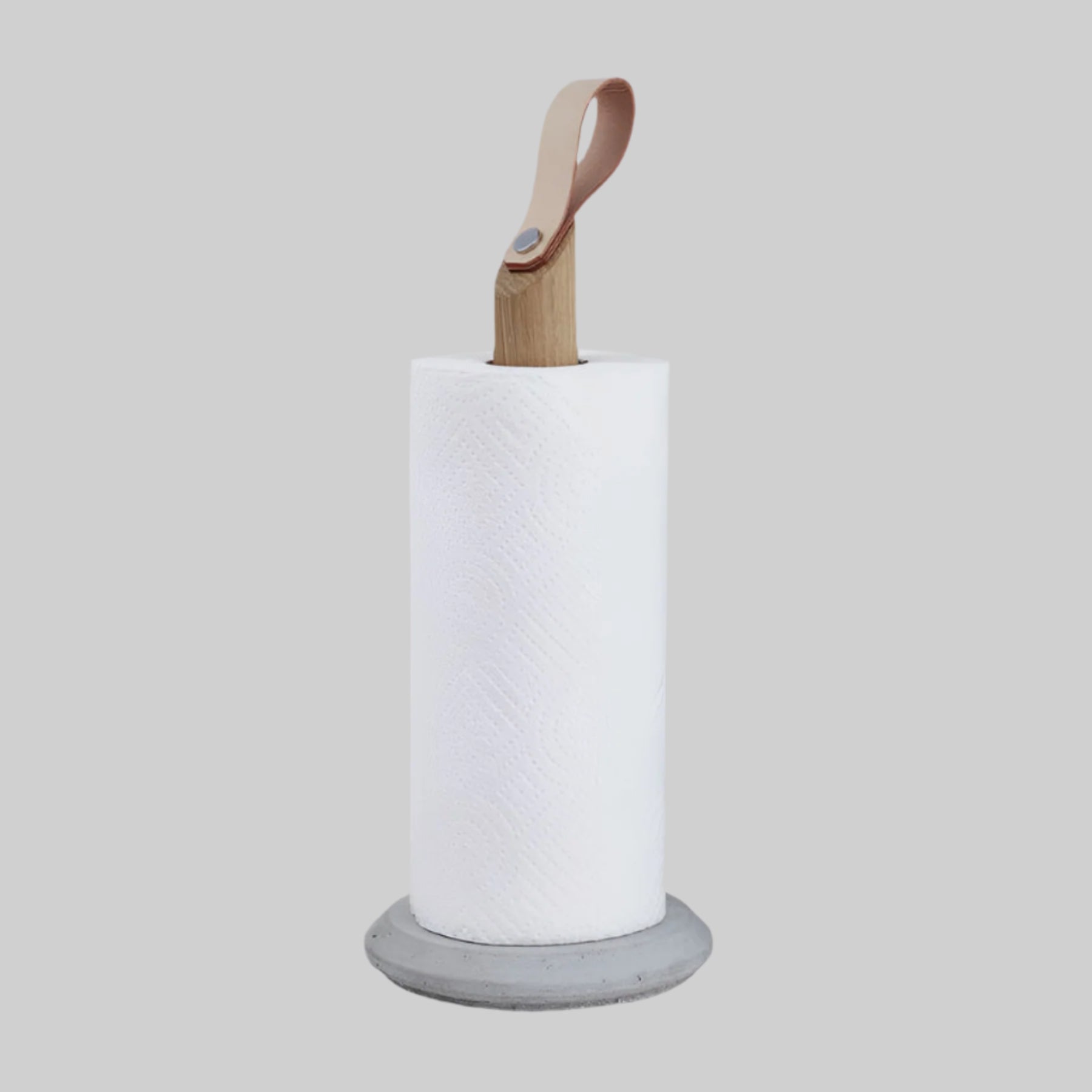 Grab Paper Towel Holder - solid oak wood, leather loop with poured concrete base has Nordic look.  This Scandinavian designed elegant paper towel holder from  is a bestselling item by Gejst Denmark.