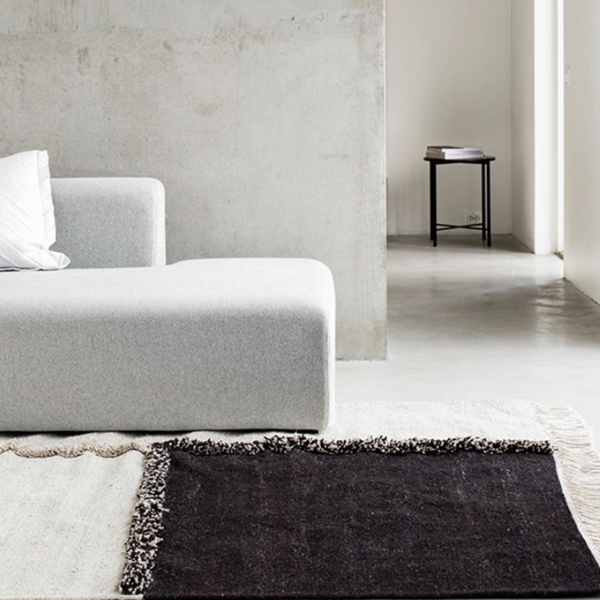 Sera Helsinki, Finnish designed hand-made rugs from Ethiopia, fair-trade, ethically made.  Available exclusively in  North America, Canada and USA, through Studio Nordhaven. E-1027 Hand Woven Rug - White + Black